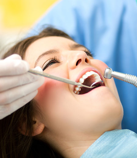 Dentist performing Dental extraction proceedure
